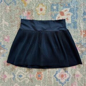 pleated black athletic skirt